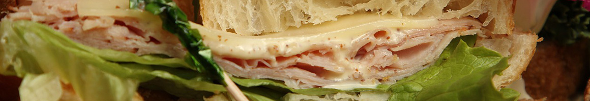Eating Sandwich at Bloomy Rind restaurant in Hingham, MA.